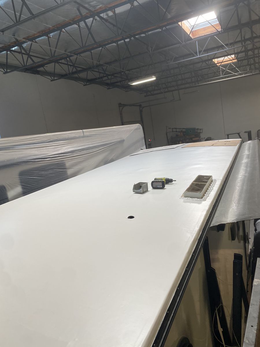 RV roof after repair, finished white membrane